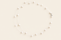 Tears from Heaven floating white freshwater pearl necklace on light beige
